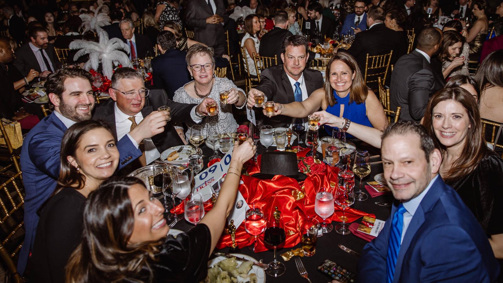 Friends celebrating at the gala